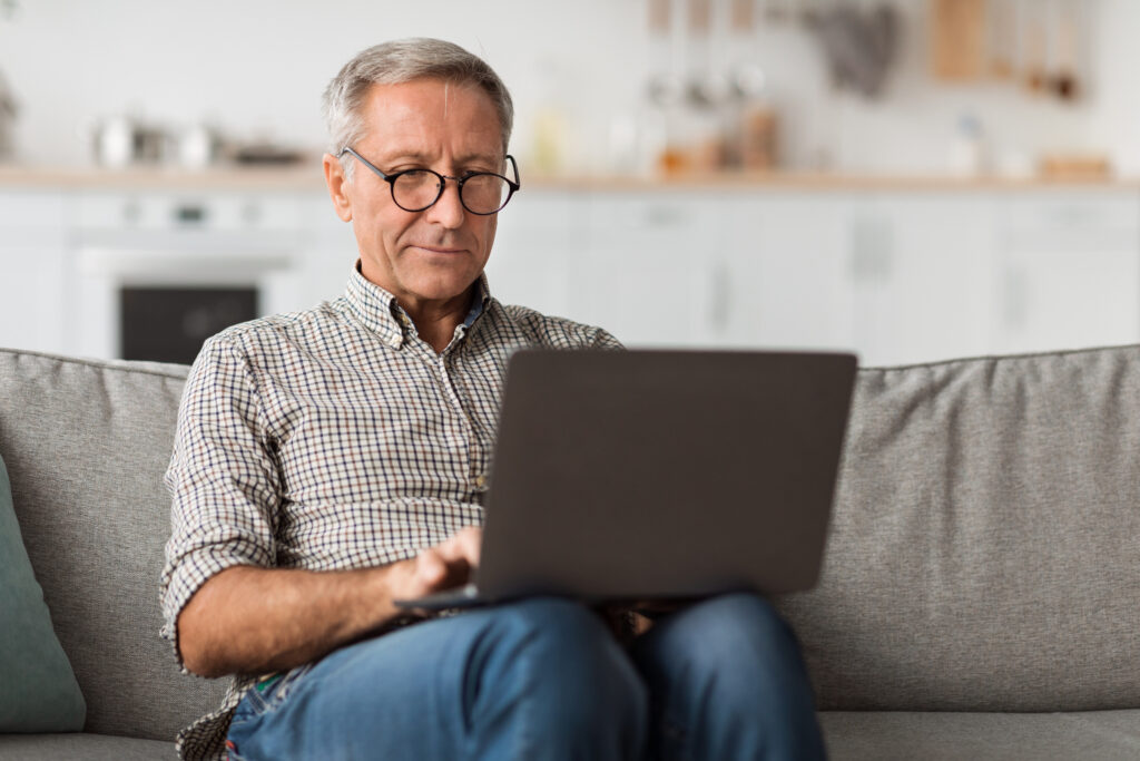 Gentlemen reviewing offers on ifinder